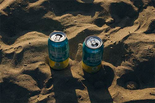 granville cans in the sand